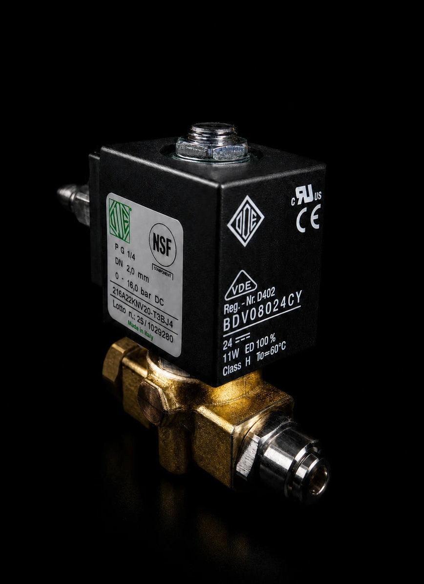Mechanical Italian solenoid valve from ODE with NSF certification labels on a black background